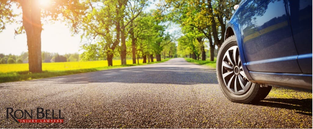 car-on-asphalt-road-in-summer-picture-id1133723896 (1) Accident Lawyer