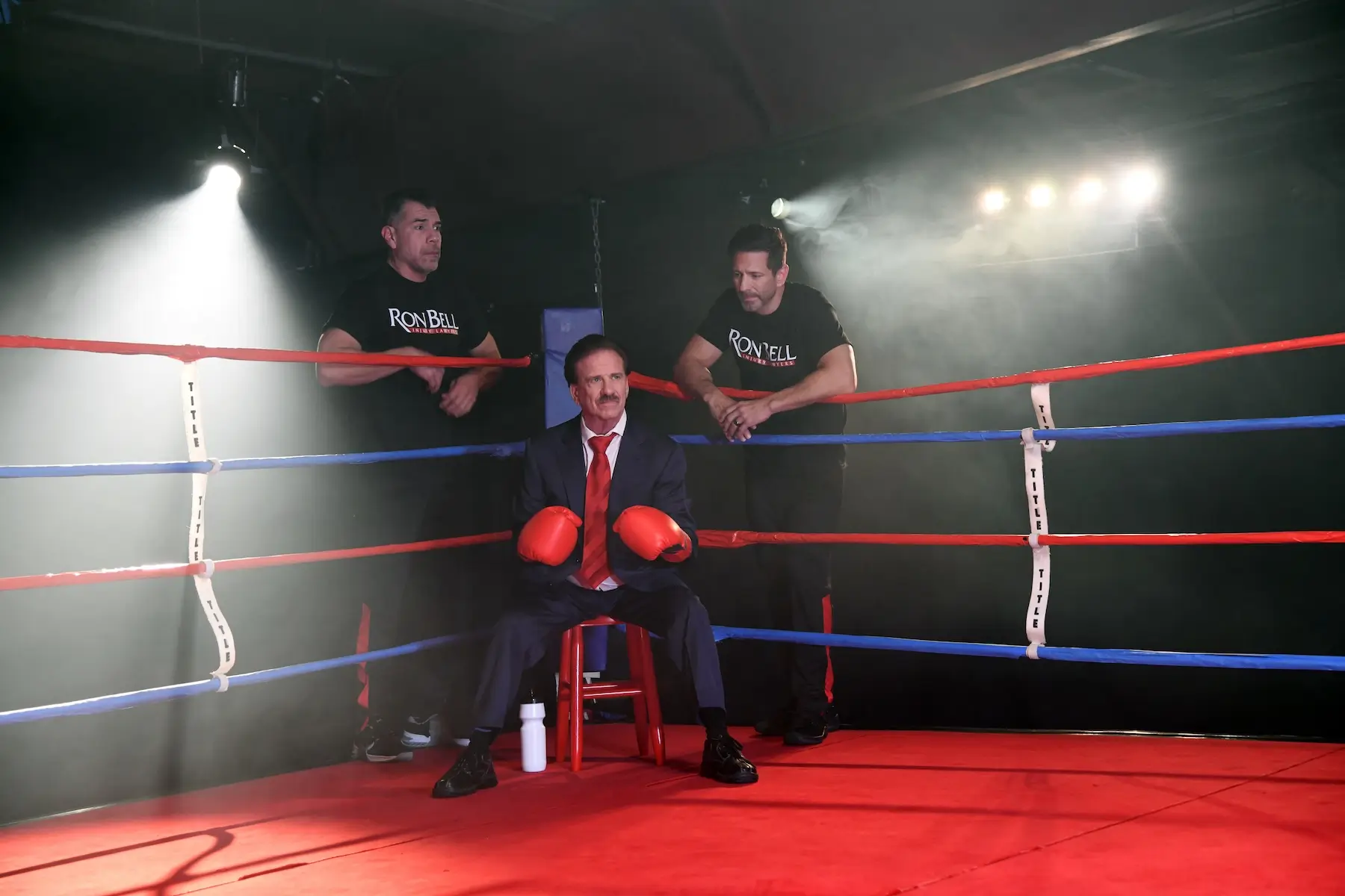 Our-Story-ModBanner Ron Bell attorney in boxing ring